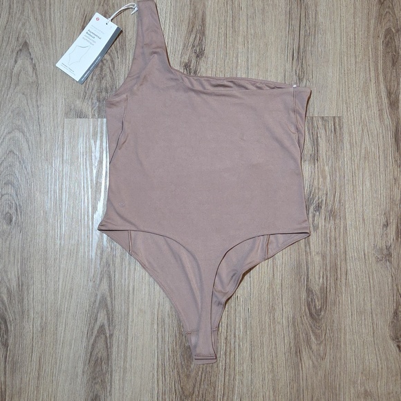 lululemon athletica Tops - Lululemon Wundermost Ultra-Soft Nulu Asymmetrical Bodysuit *Twilight Rose Size L